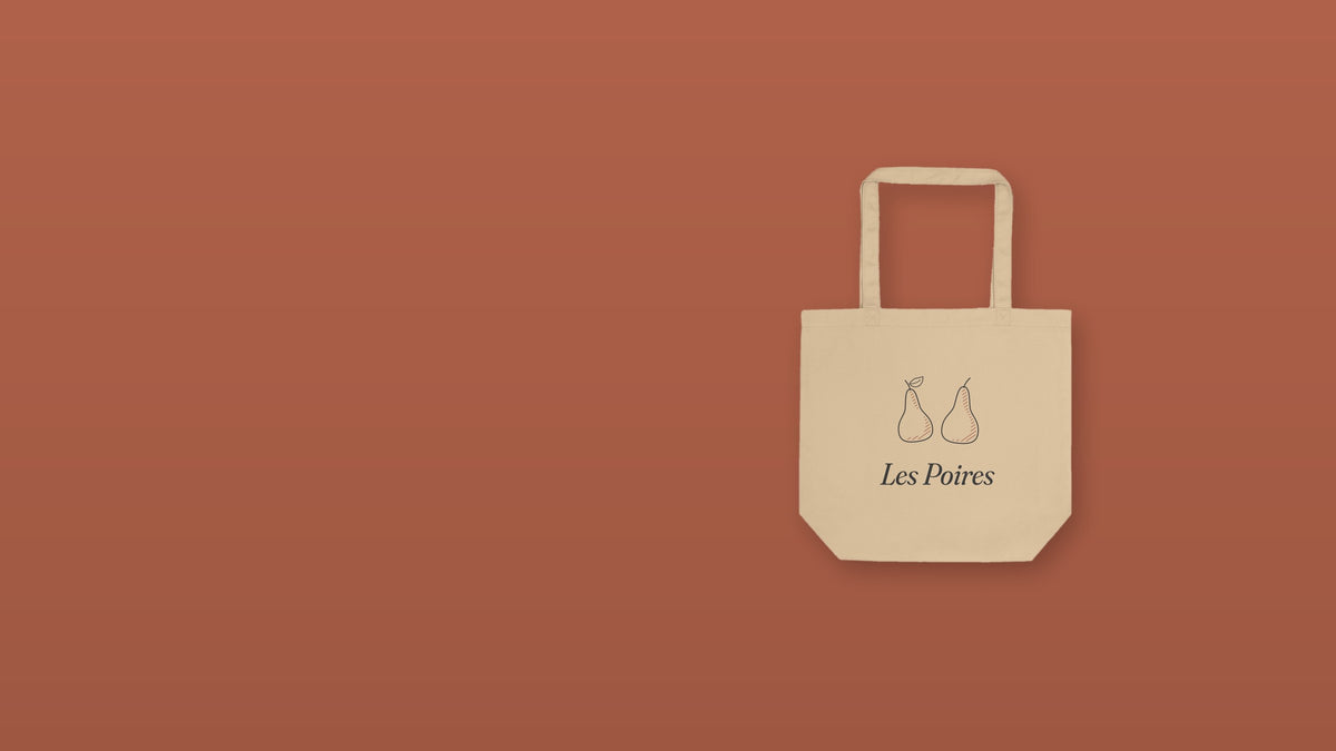 The Les Poires Tote, flat front with straps up, on terracotta - Good Vibes Bad Ideas