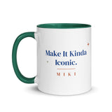The Make It Kinda Iconic Mug with a dark green inside and handle: Make It Kinda Iconic. in cobalt serif, M I K I in terracotta below