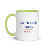 The Make It Kinda Iconic Mug with a green inside and handle: Make It Kinda Iconic. in cobalt serif, M I K I in terracotta below