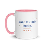 The Make It Kinda Iconic Mug with a pink inside and handle: Make It Kinda Iconic. in cobalt serif, M I K I in terracotta below
