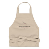 The Reduced with Wine Apron, folded with straps