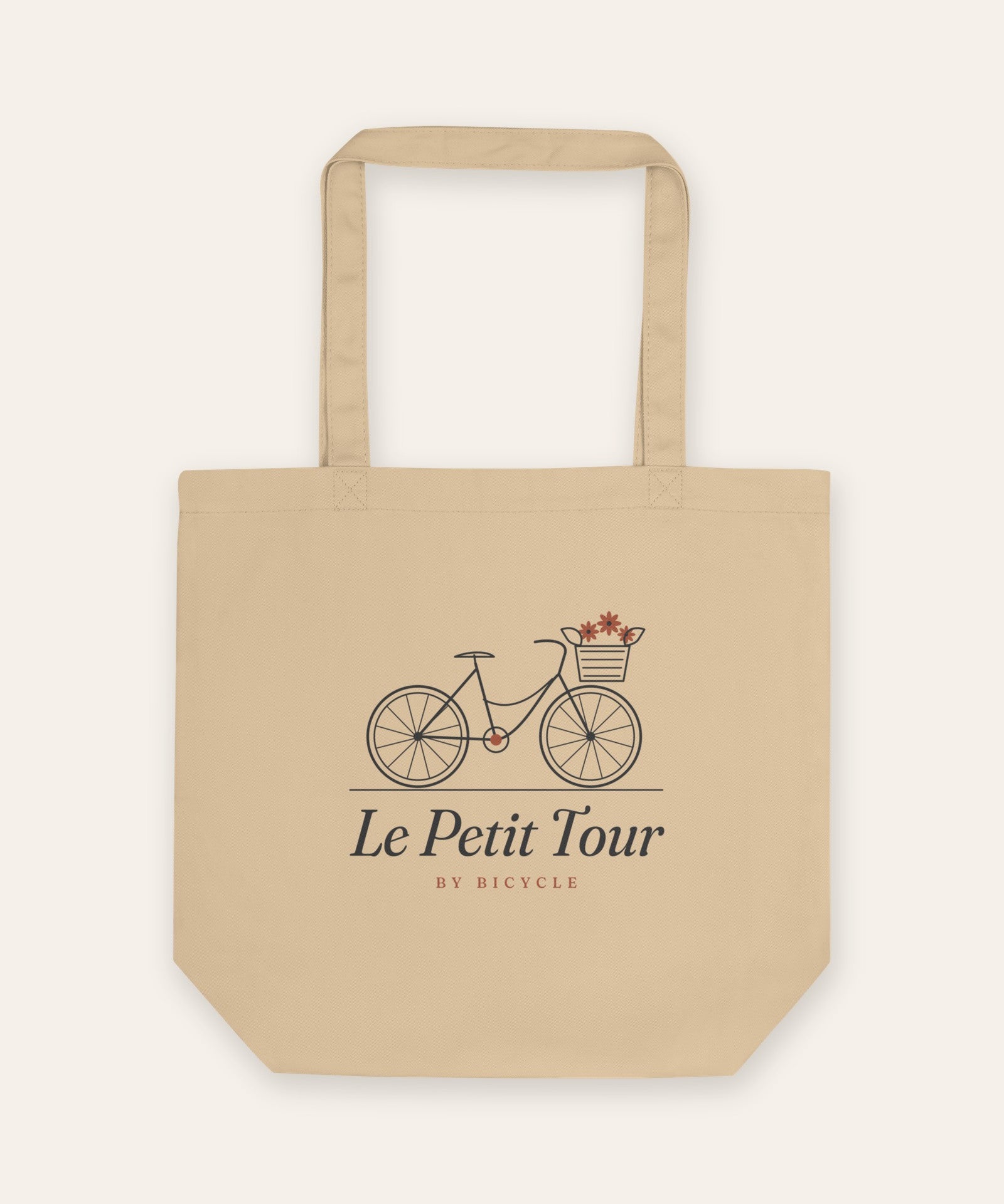 Le Petit Tour Tote in Oyster, flat lay front, product shot on cream