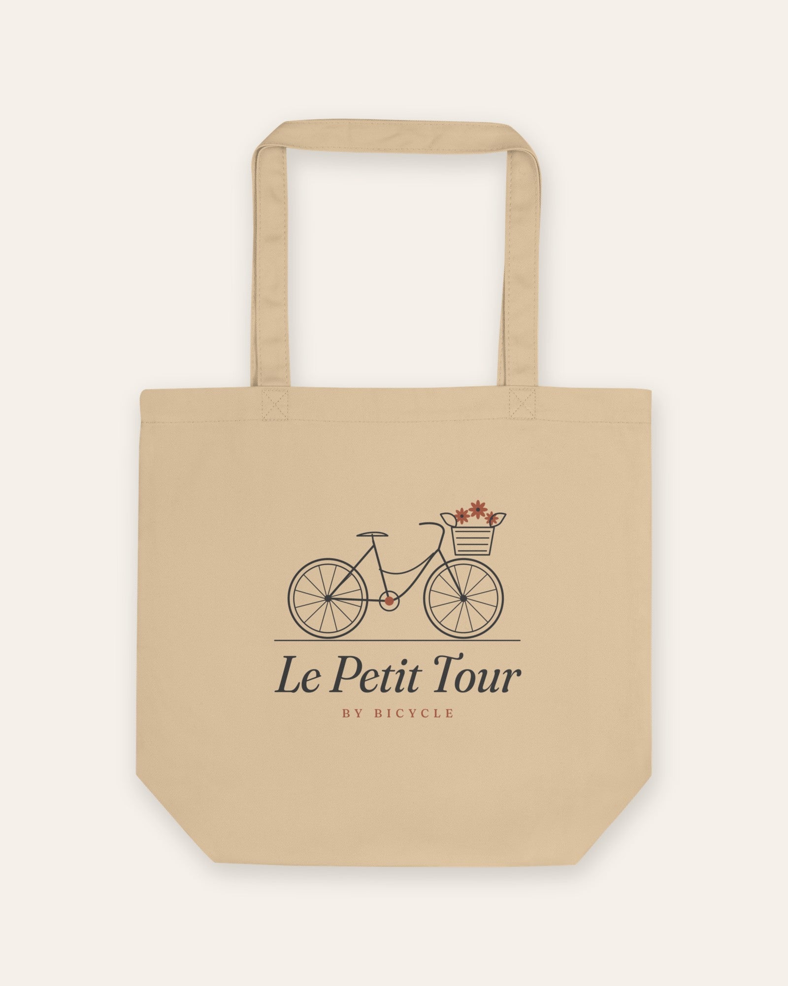 Le Petit Tour Tote in Oyster, flat lay front, product shot on cream