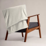 The Blanket Statement Throw, styled lifestyle shot