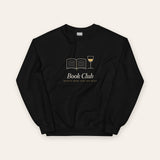 The Book Club Crewneck in Black, flat lay front, product shot on cream