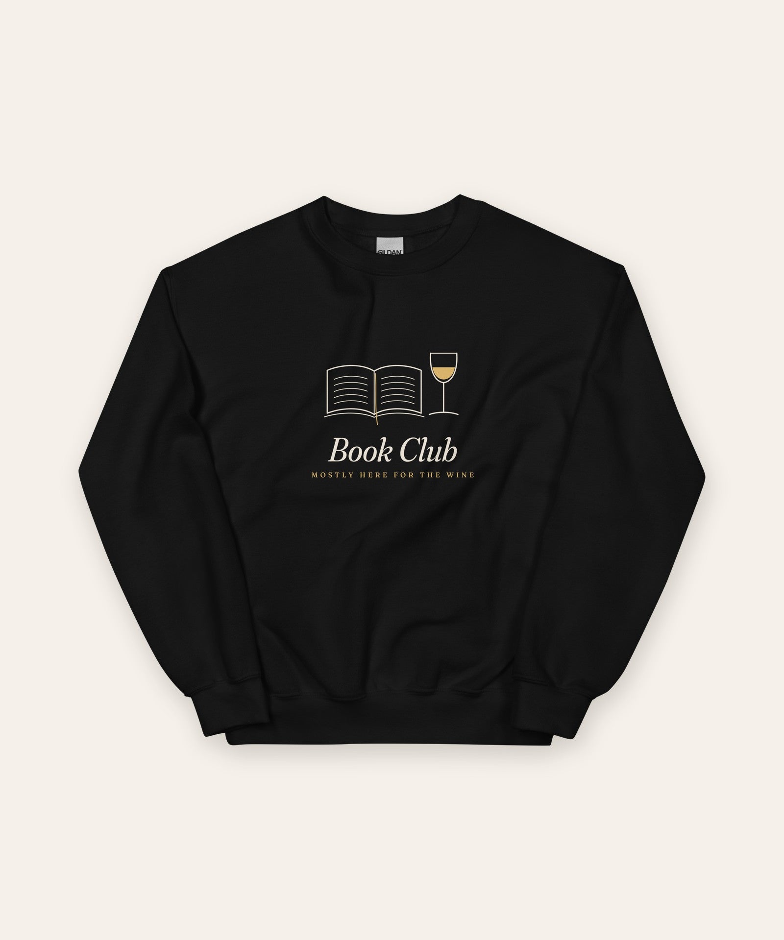 The Book Club Crewneck in Black, flat lay front, product shot on cream