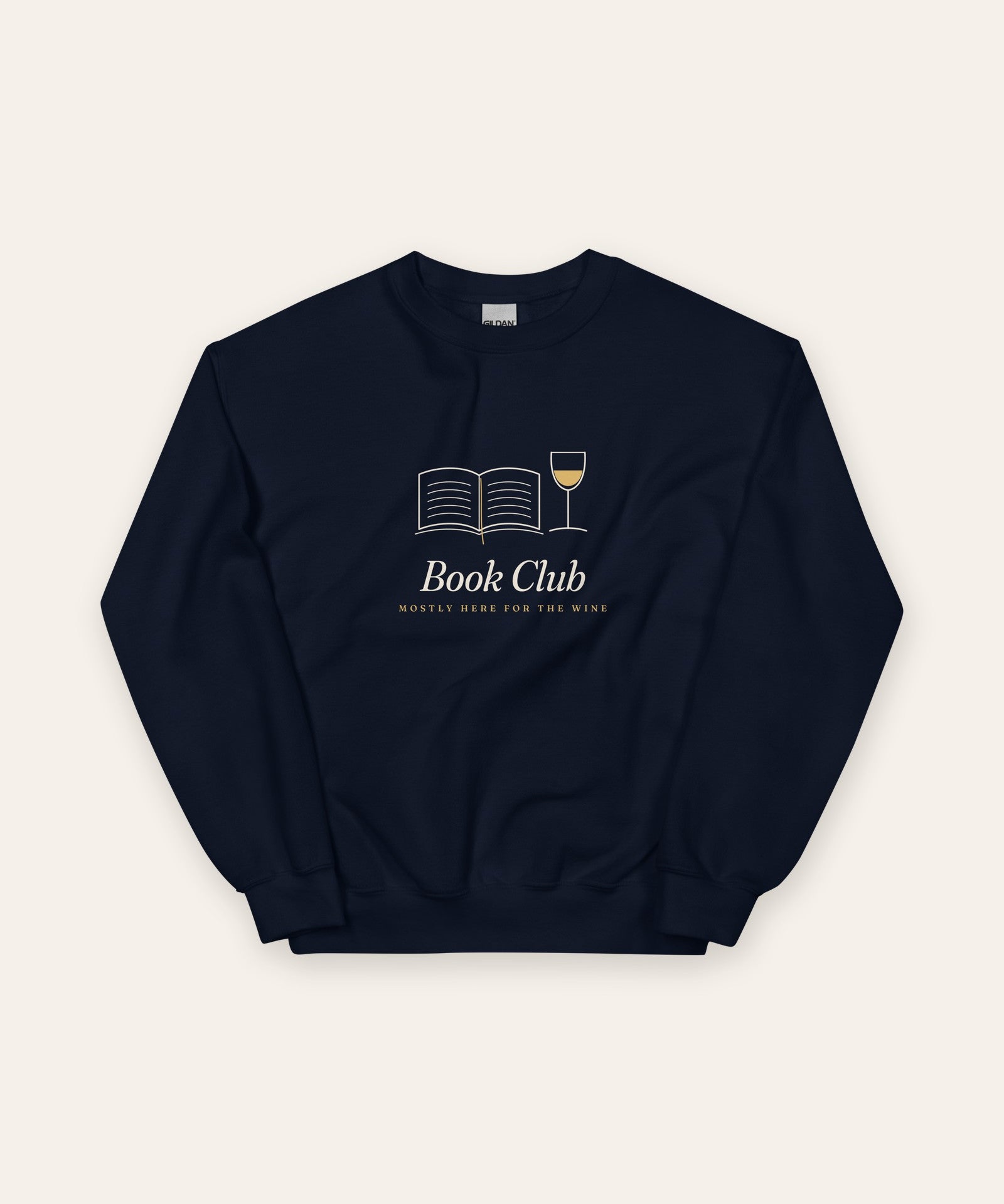 The Book Club Crewneck in Navy, flat lay front, product shot on cream