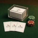 The House Rules Playing Cards, three cards on green felt beside the deck in its clear box and a stack of poker chips