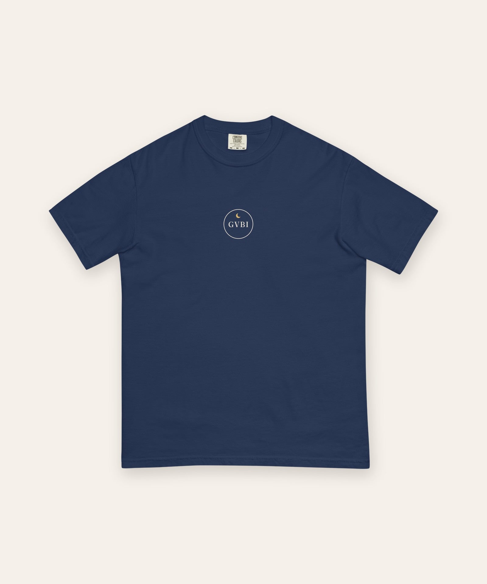 The House Crest Tee in True Navy, flat lay front, product shot on cream