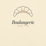 The Boulangerie Tee in Ivory, close-up detail