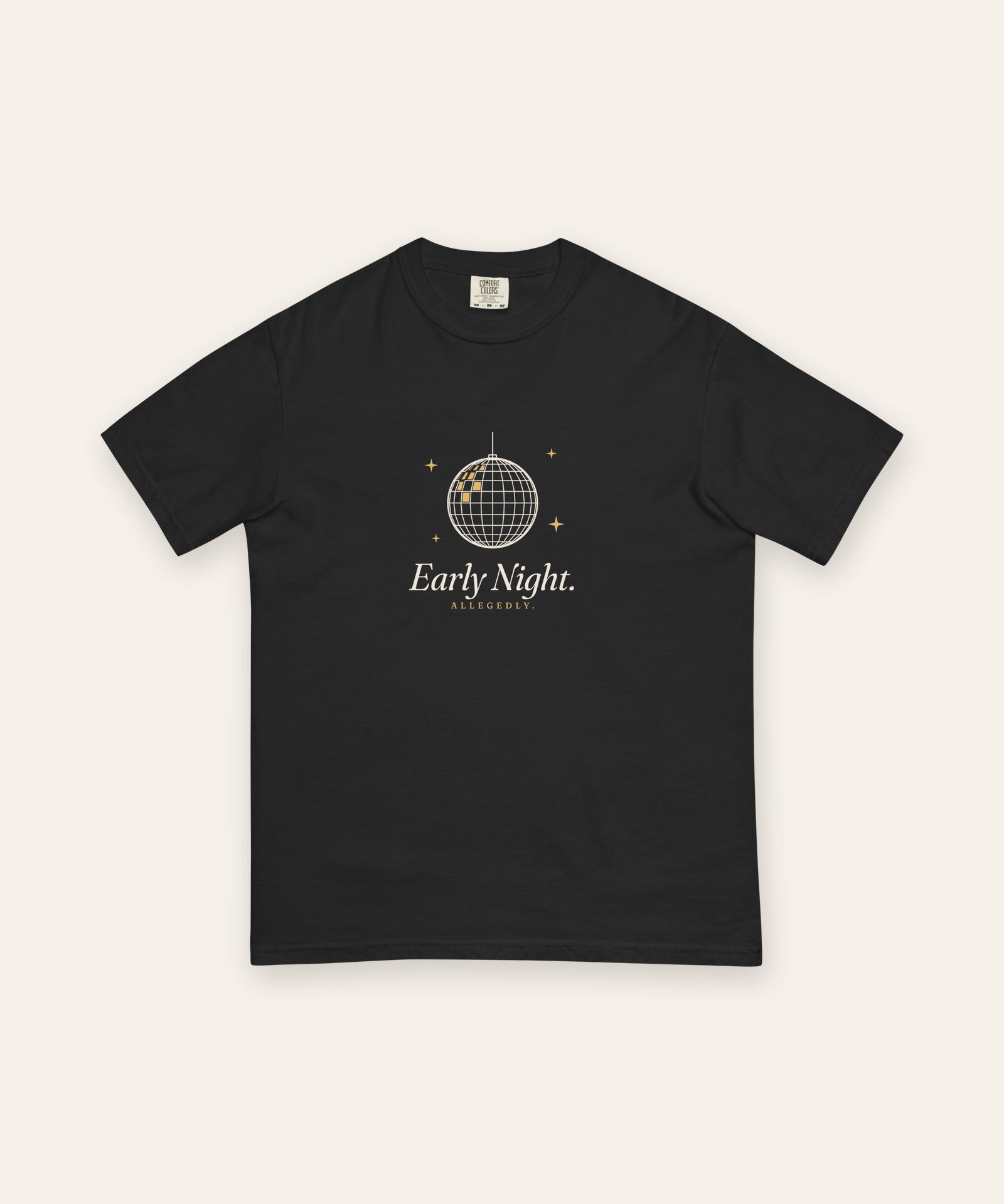 The Early Night Tee in Black, flat lay front, product shot on cream