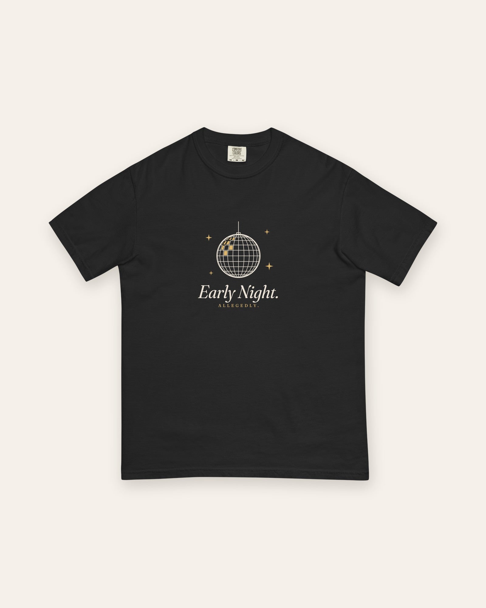 The Early Night Tee in Black, flat lay front, product shot on cream