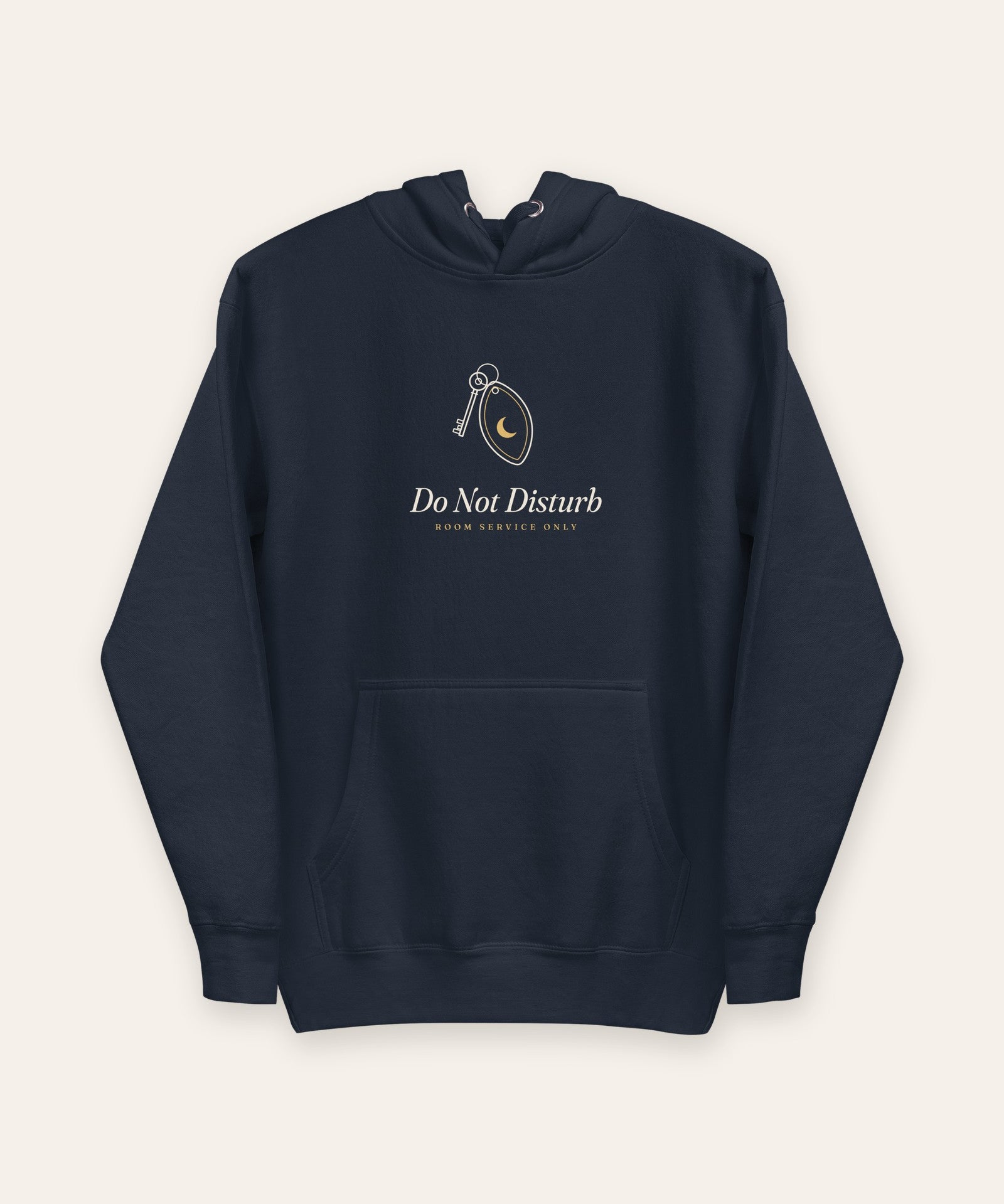 The Do Not Disturb Hoodie in Navy Blazer, flat lay front, product shot on cream
