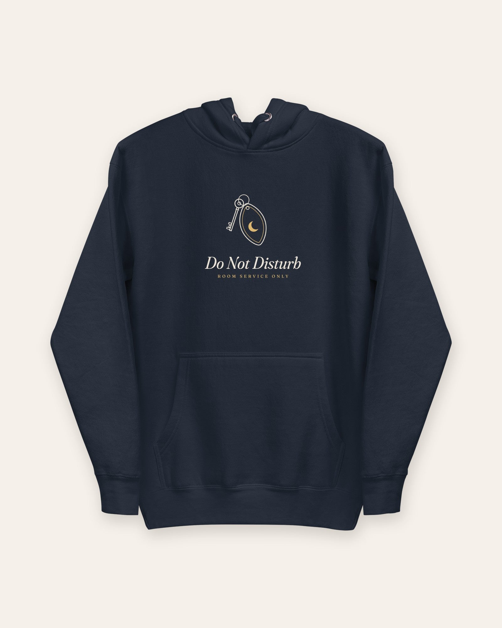 The Do Not Disturb Hoodie in Navy Blazer, flat lay front, product shot on cream