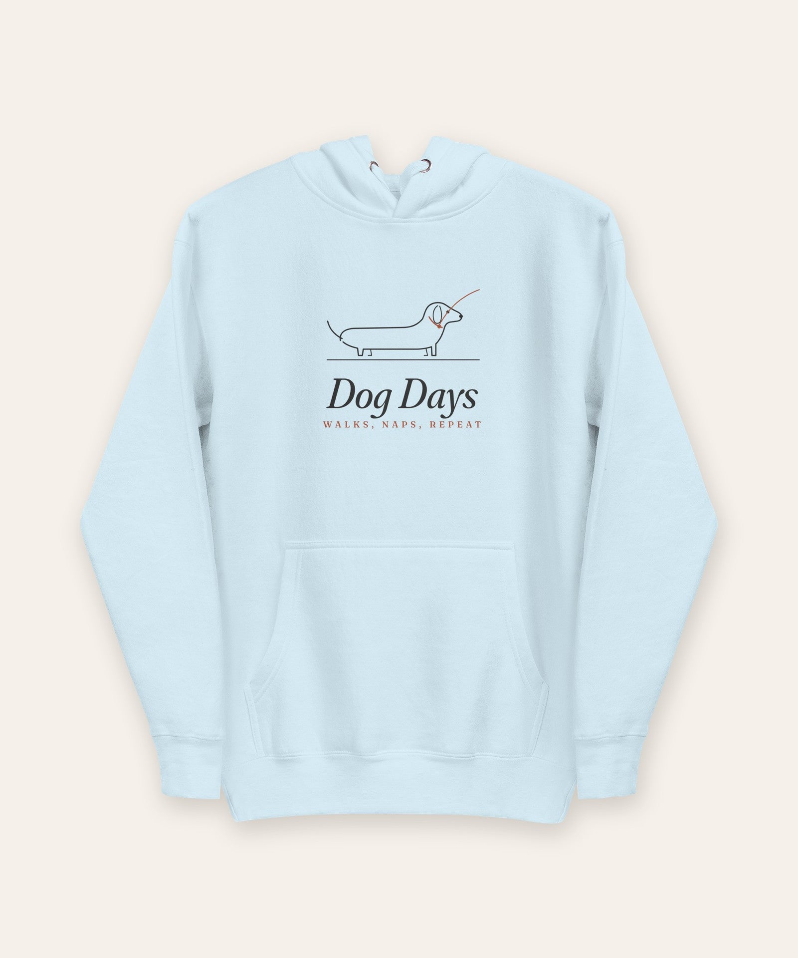 The Dog Days Hoodie in Sky Blue, flat lay front, product shot on cream