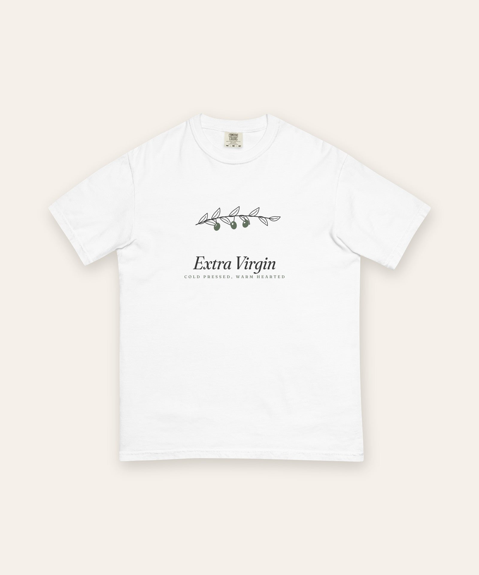 The Extra Virgin Tee in White, flat lay front, product shot on cream