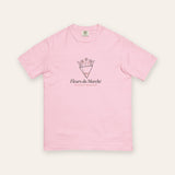 The Fleurs du Marché Tee in Blossom, flat lay front, product shot on cream