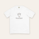 The Fleurs du Marché Tee in White, flat lay front, product shot on cream
