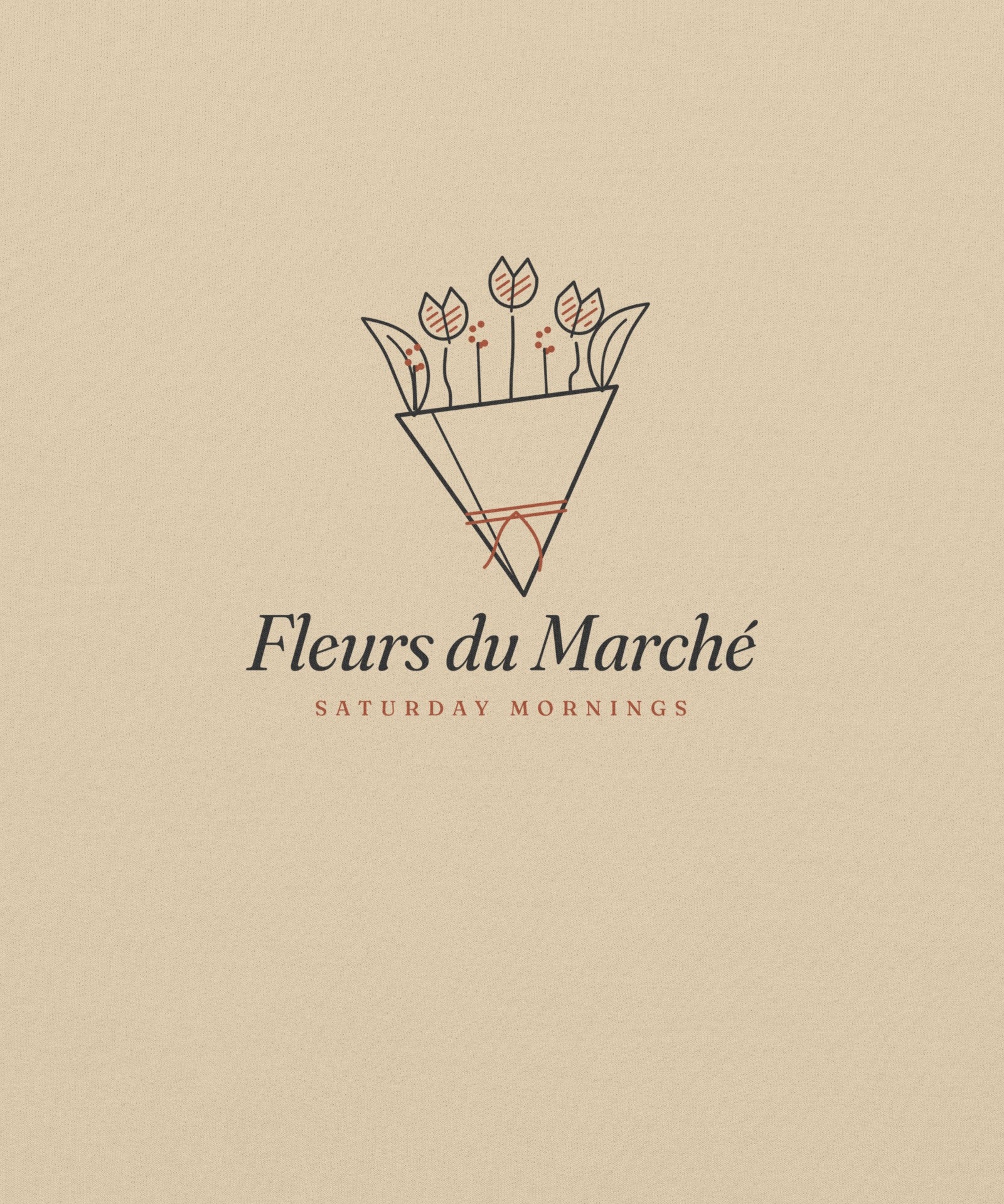 The Fleurs du Marché Crewneck in Sand, close-up detail