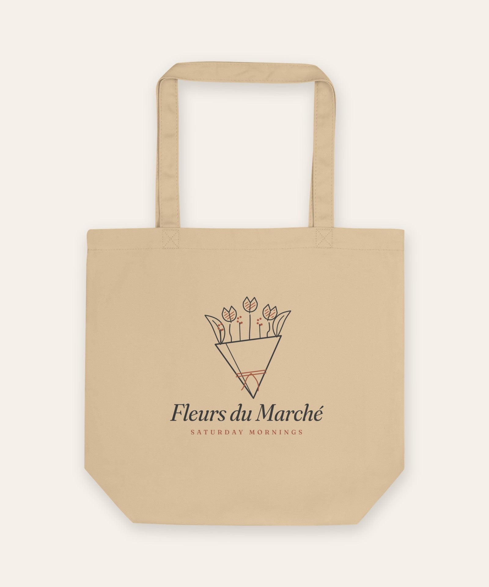The Fleurs du Marché Tote in Oyster, flat lay front, product shot on cream