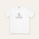 The Grate Expectations Tee in White, flat lay front, product shot on cream