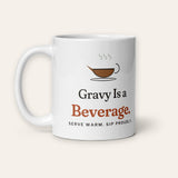 The Gravy Is a Beverage Mug, 11 oz, other side, handle on left, product shot on cream