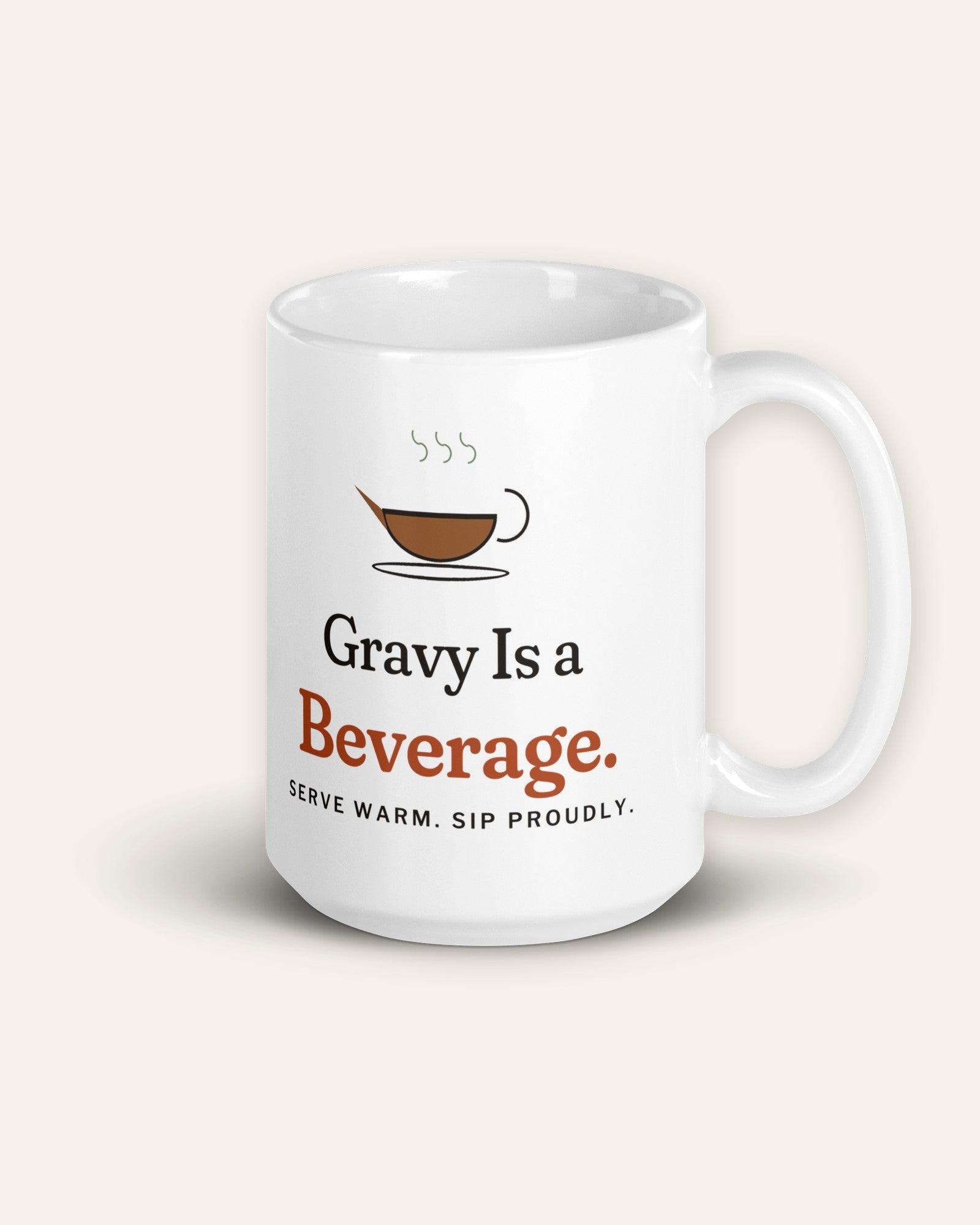 The Gravy Is a Beverage Mug, 15 oz, front, handle on right, product shot on cream