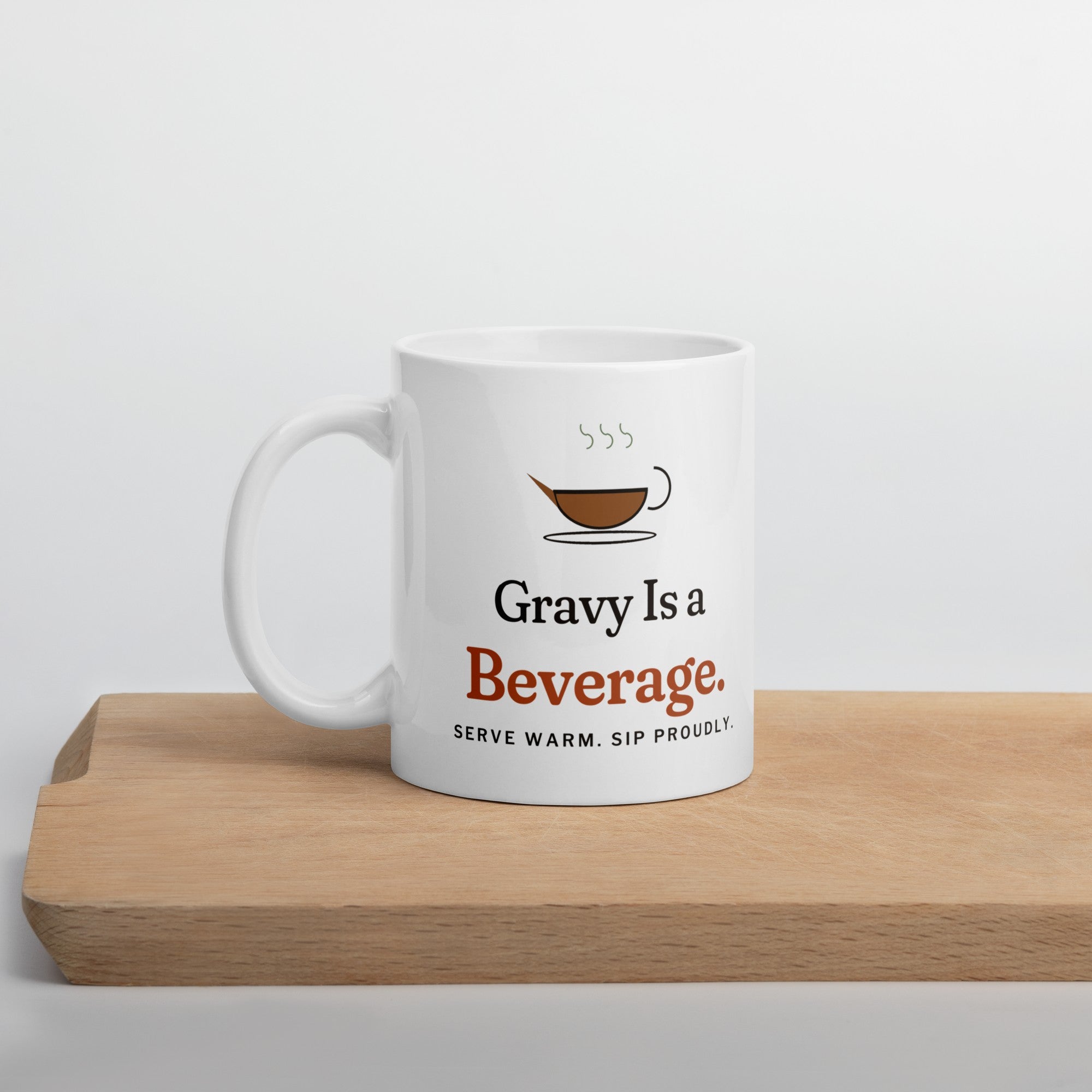 The Gravy Is a Beverage Mug on a wooden cutting board