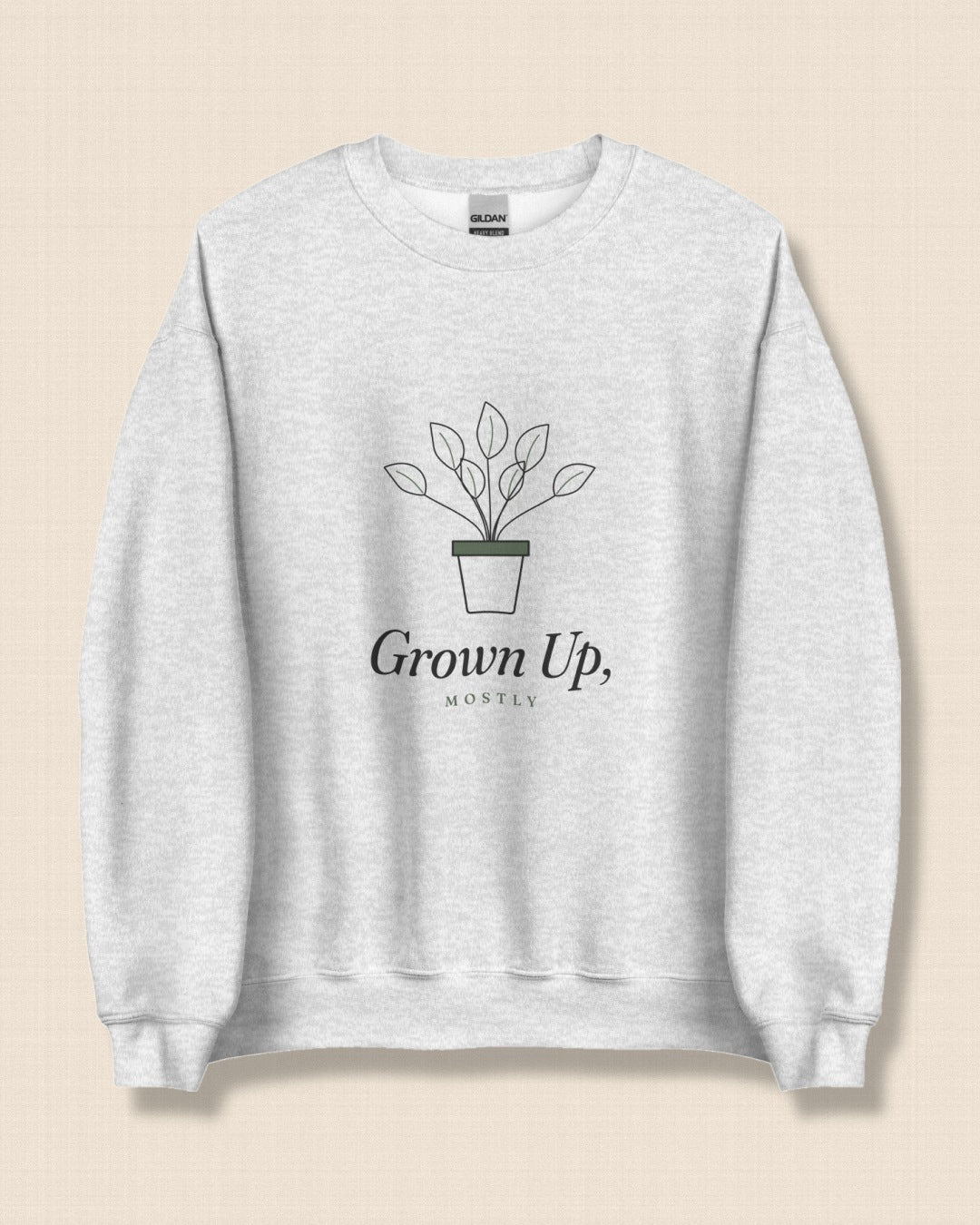 The Grown Up, Mostly Crewneck in Ash, flat lay on linen