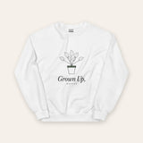 The Grown Up, Mostly Crewneck in White, flat lay front, product shot on cream