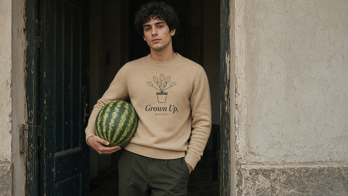 Deadpan with a whole watermelon in a doorway - The Grown Up, Mostly Crewneck - Good Vibes Bad Ideas