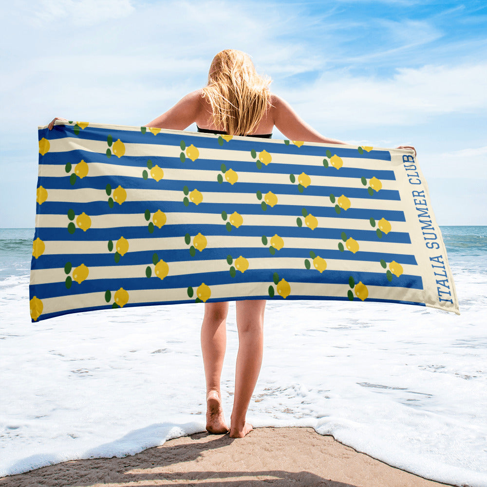 The Italia Summer Club Beach Towel, held open at the beach