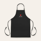 The Head Chef Apron in Black, flat lay front, product shot on cream