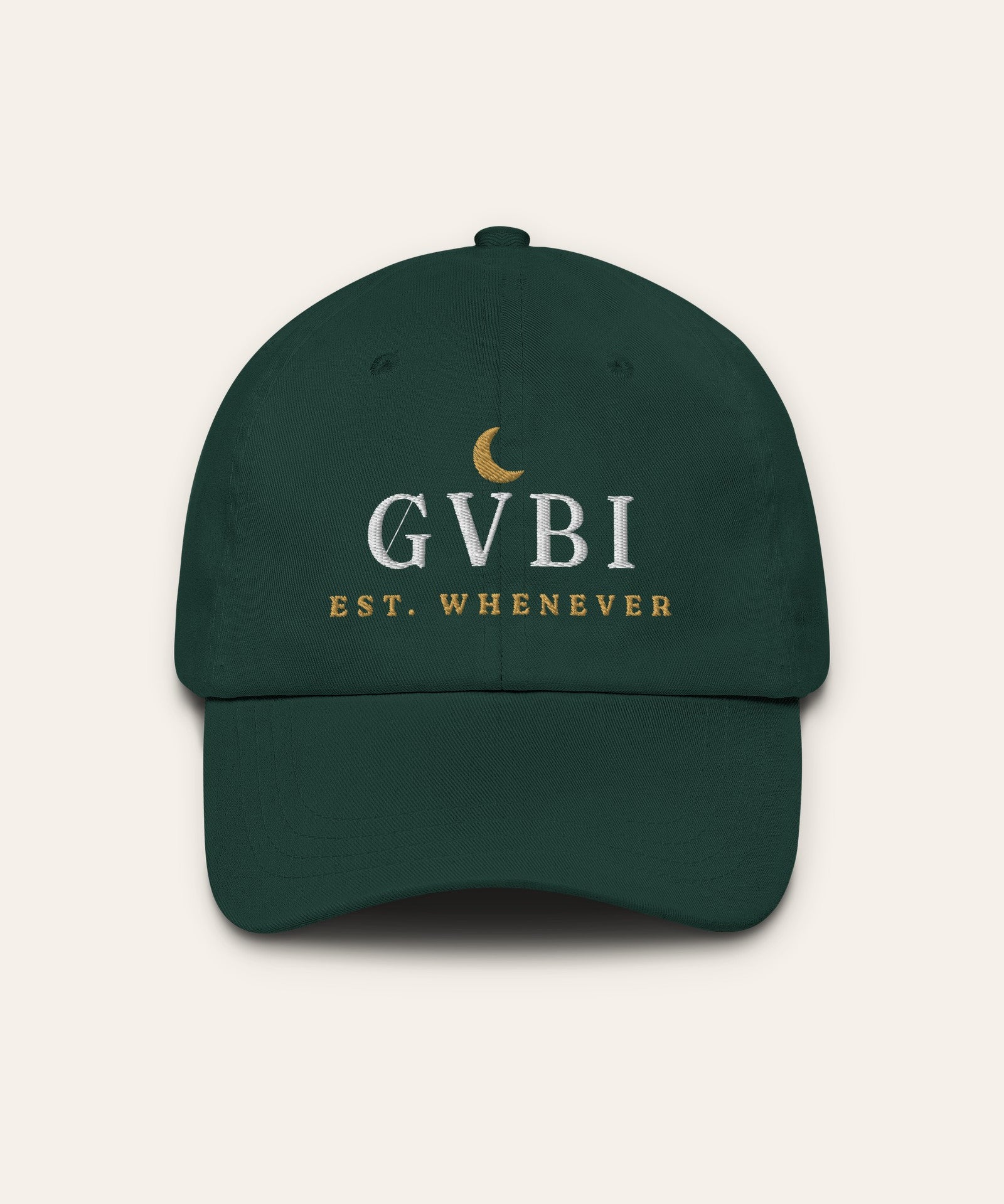The House Dad Hat in Spruce, flat lay front, product shot on cream