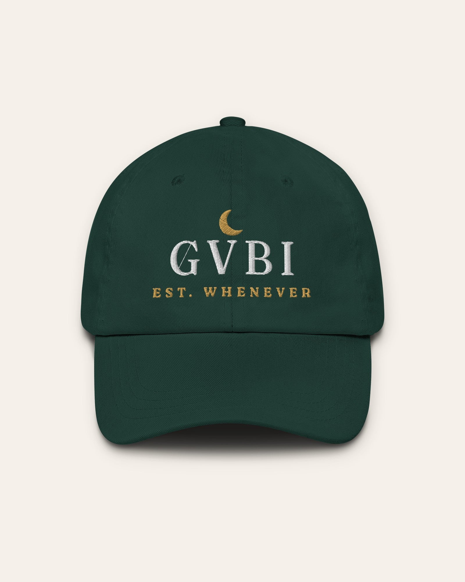 The House Dad Hat in Spruce, flat lay front, product shot on cream