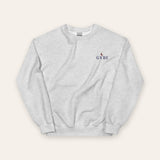 The House Crewneck in Ash, flat lay front, product shot on cream