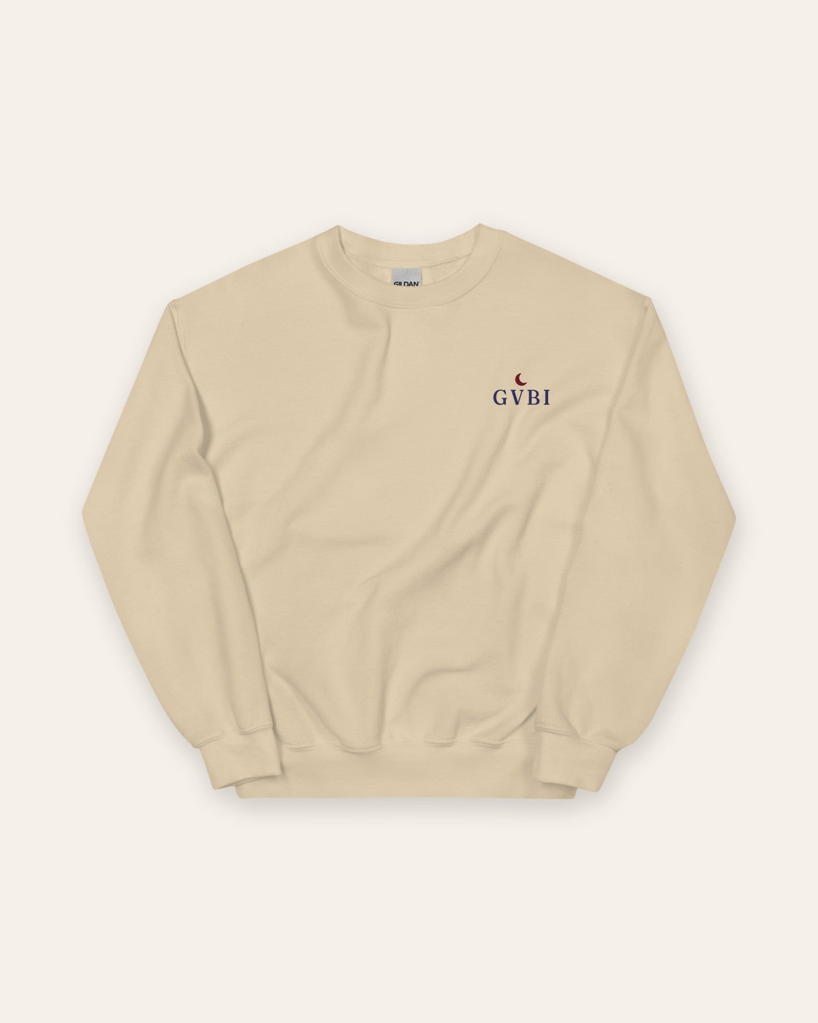 The House Crewneck in Sand, flat lay front, product shot on cream