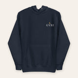 The House Hoodie in Navy Blazer, flat lay front, product shot on cream