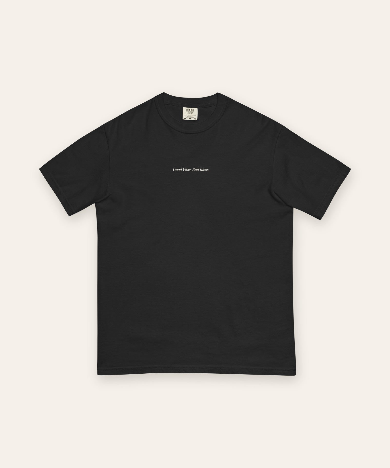 The House Tee in Black, flat lay front, product shot on cream