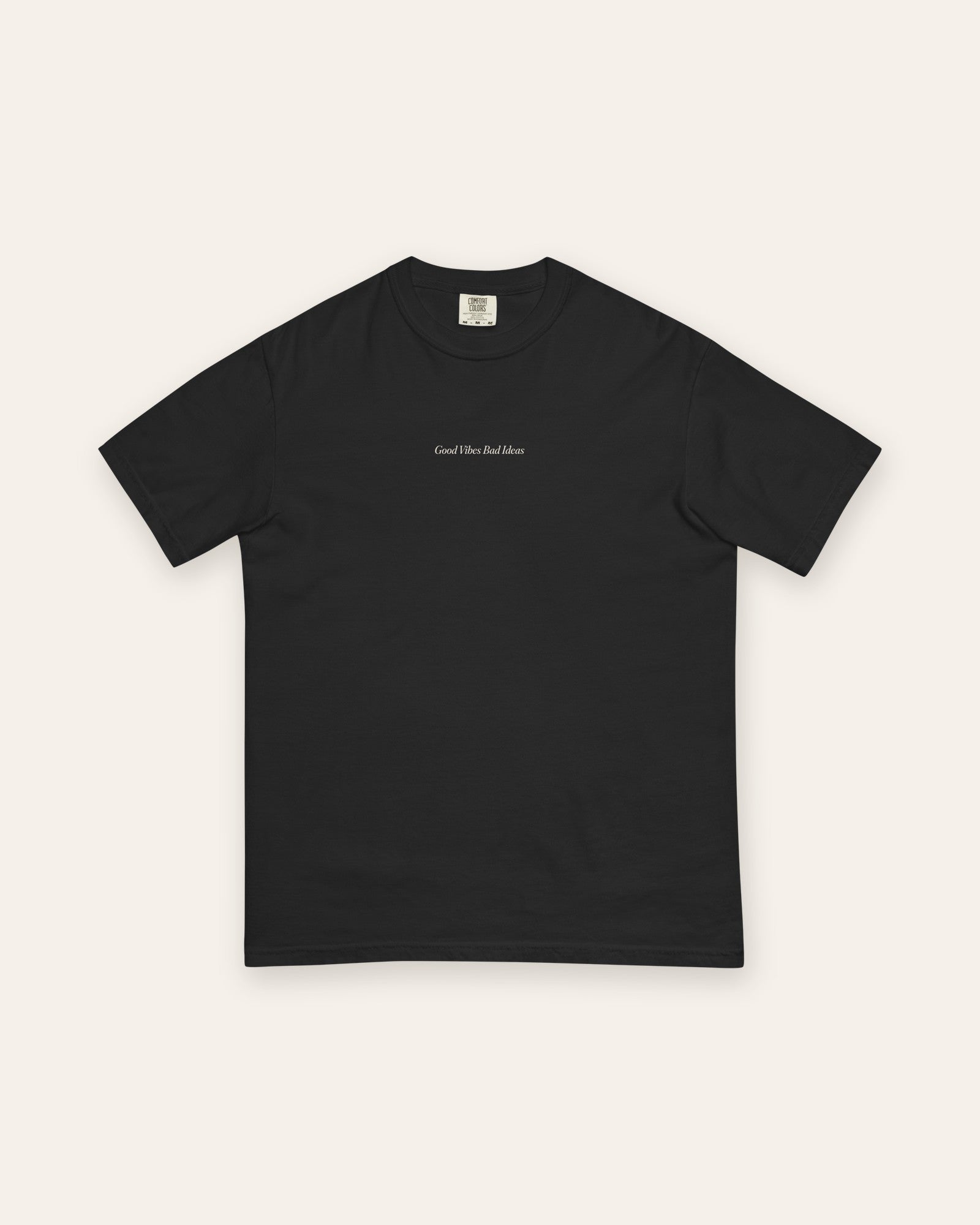 The House Tee in Black, flat lay front, product shot on cream