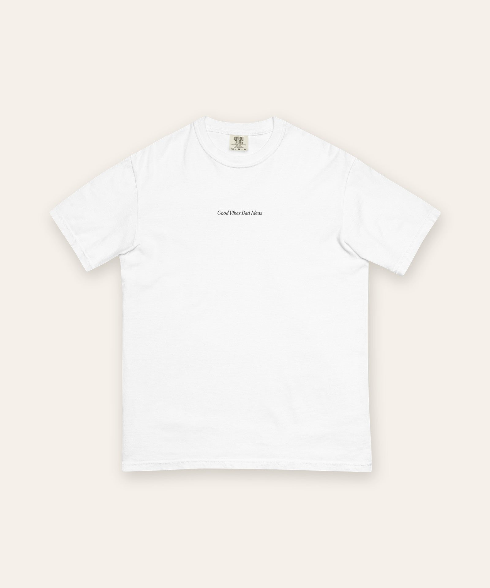 The House Tee in White, flat lay front, product shot on cream