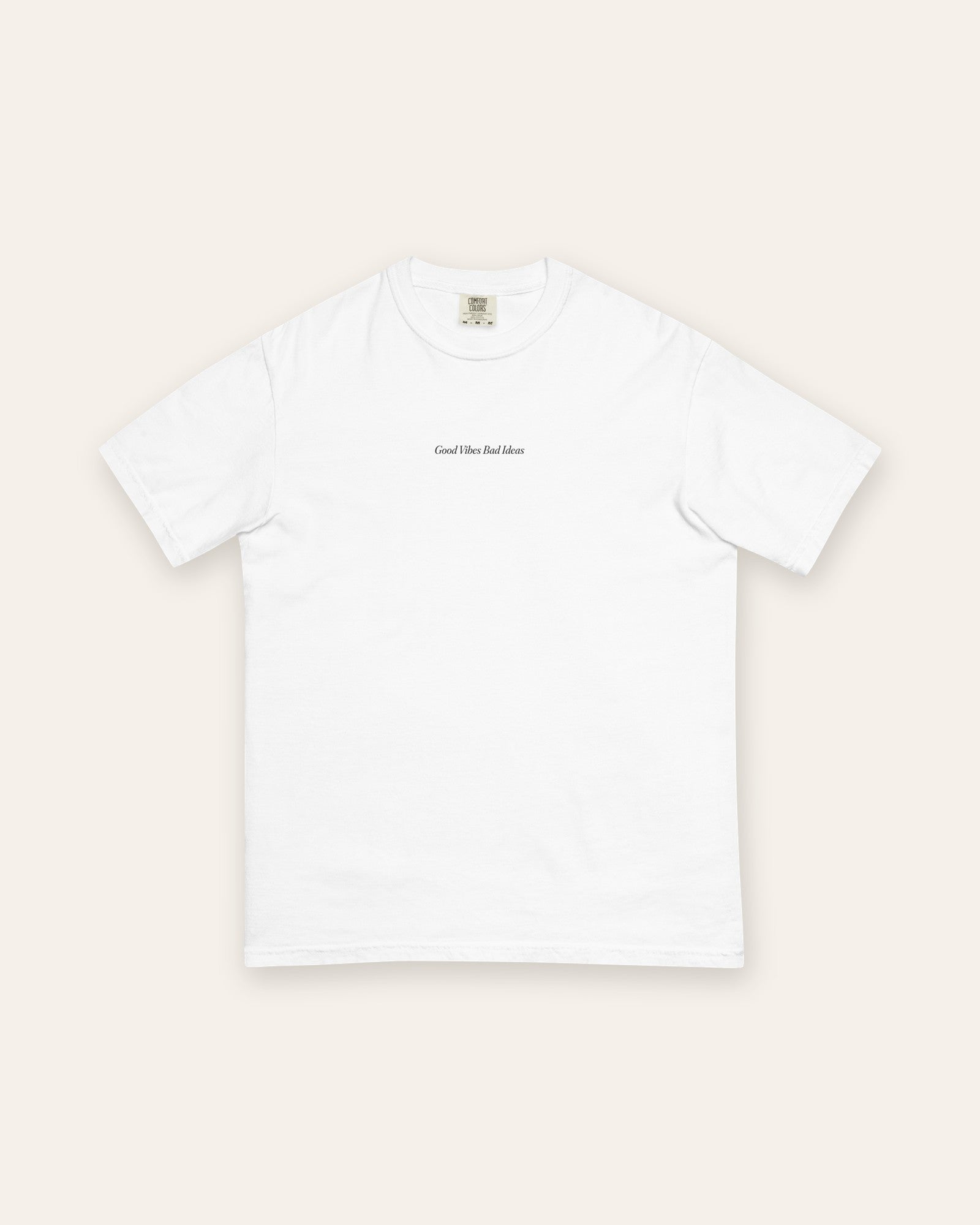 The House Tee in White, flat lay front, product shot on cream