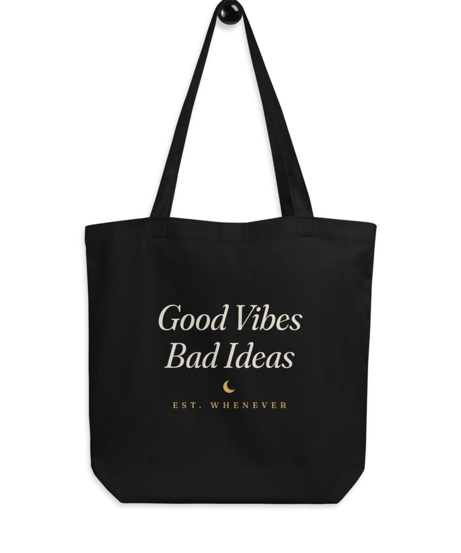 The House Tote in Black, flat lay front, product shot on cream