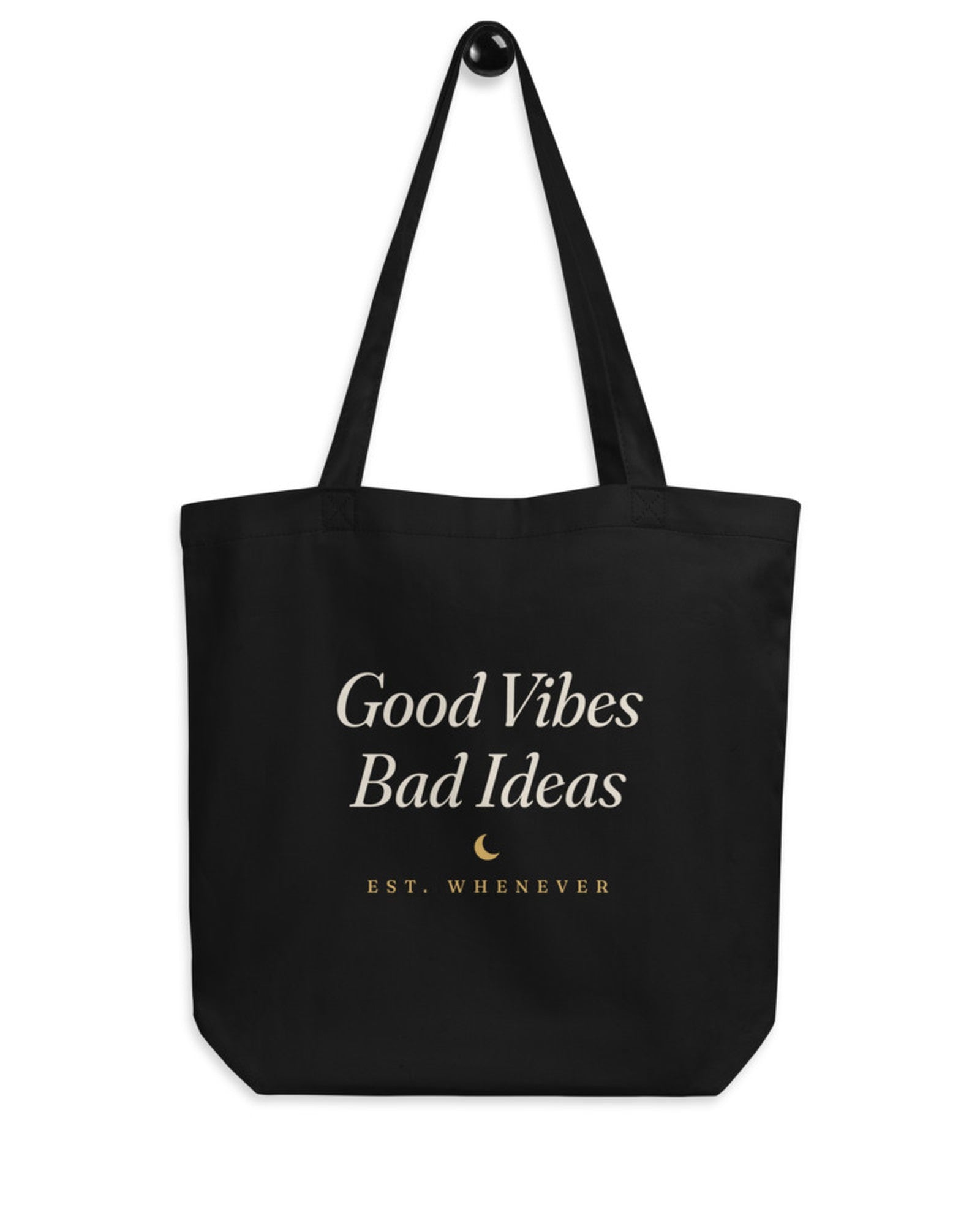 The House Tote in Black, flat lay front, product shot on cream