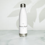 The Hydrated, Allegedly Water Bottle in White, styled lifestyle shot