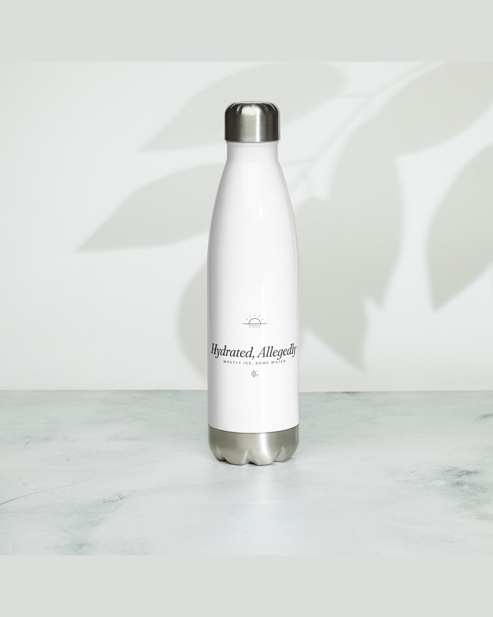 The Hydrated, Allegedly Water Bottle in White, styled lifestyle shot