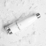 The Hydrated, Allegedly Water Bottle in White, styled lifestyle shot