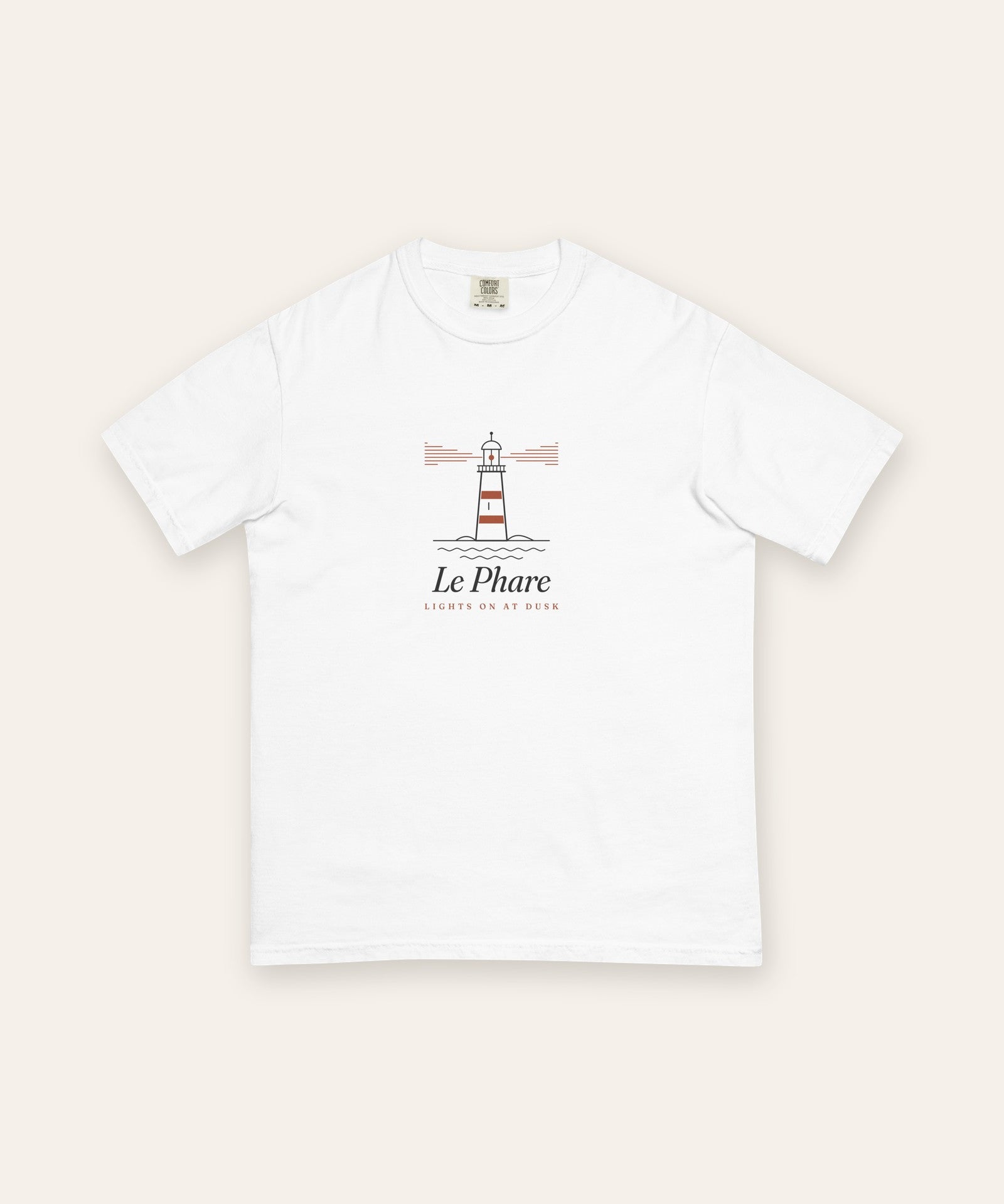 Le Phare Tee in White, flat lay front, product shot on cream