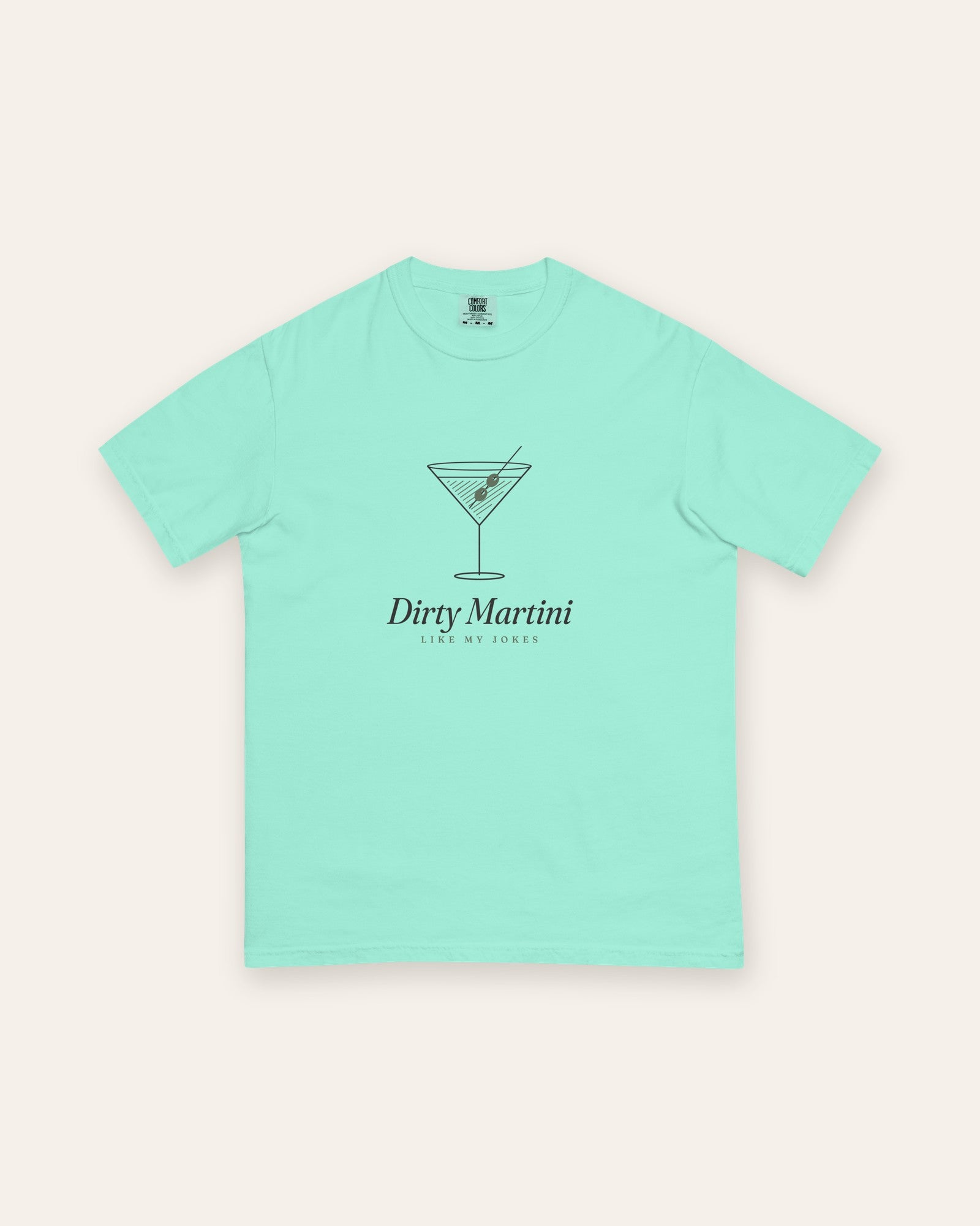 The Dirty Martini Tee in Chalky Mint, flat lay front, product shot on cream