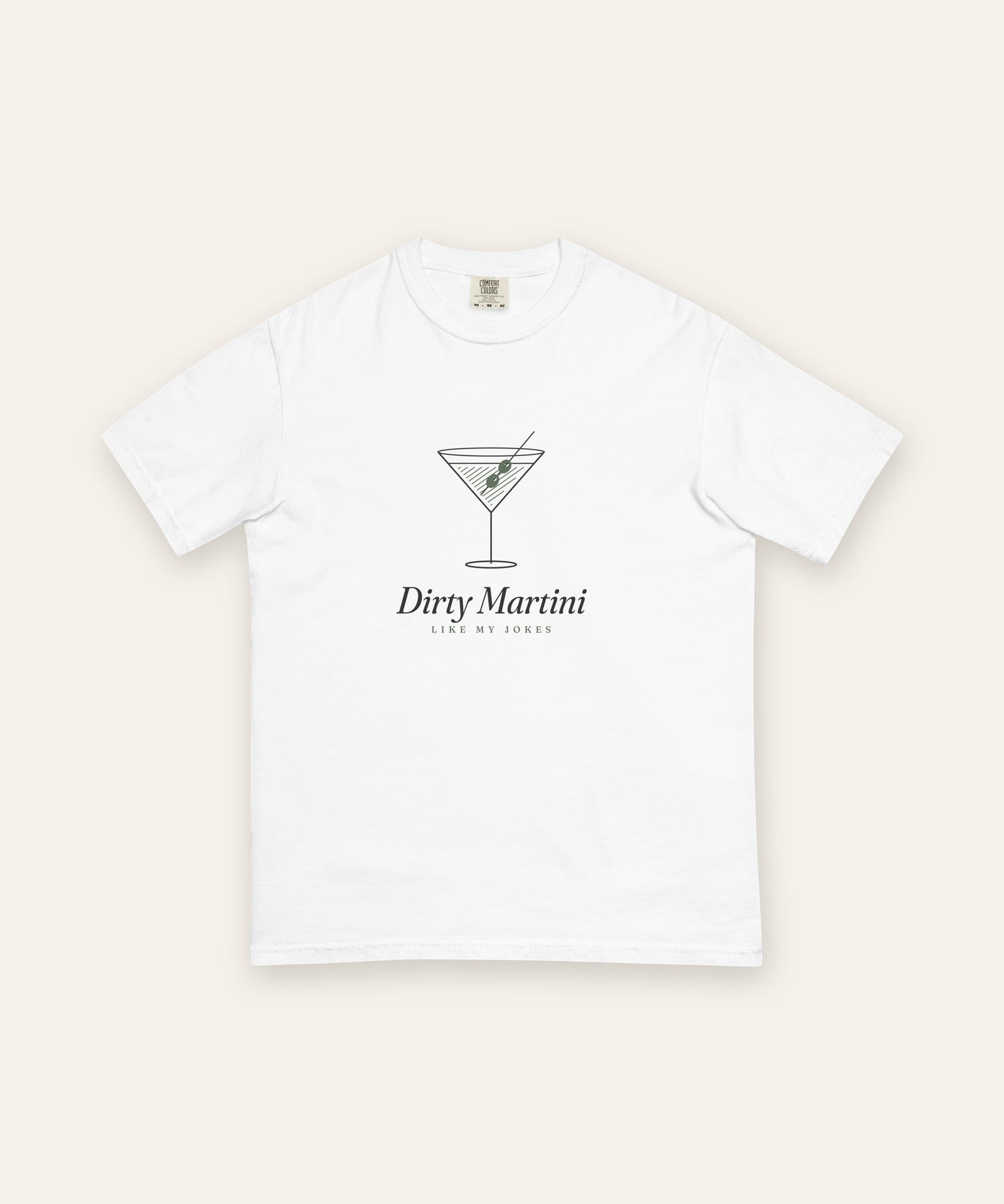 The Dirty Martini Tee in White, flat lay front, product shot on cream